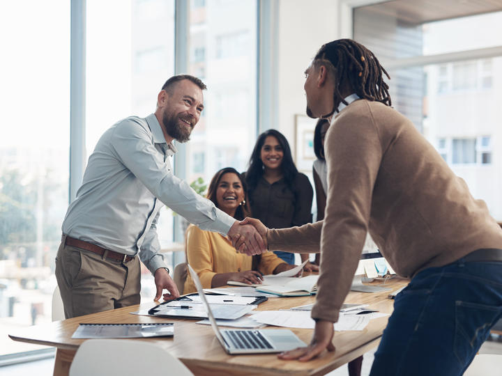 coworkers greeting each other