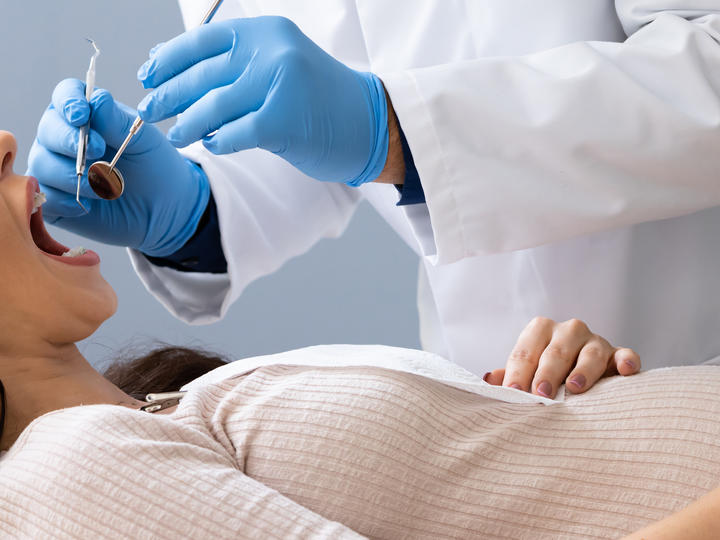 pregnant woman at dentist