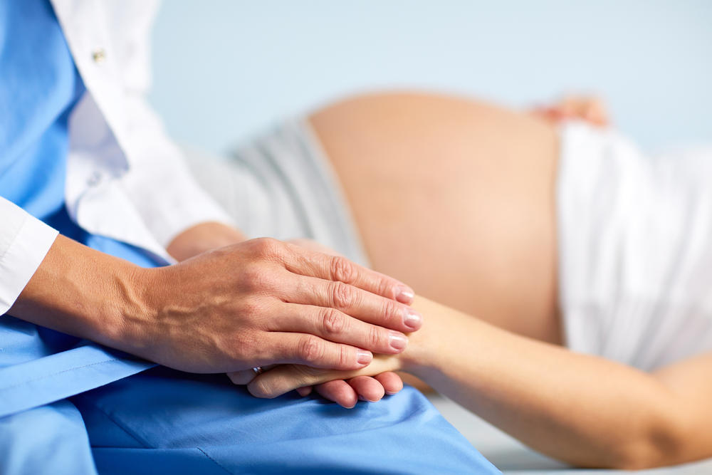 doctor with pregnant woman