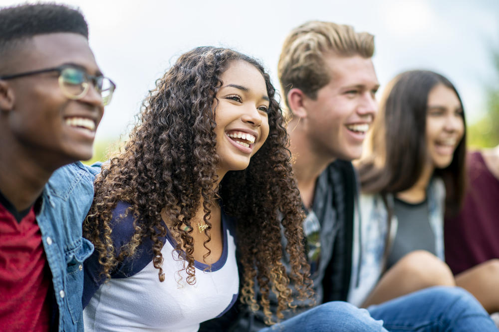 group of young adults smiling