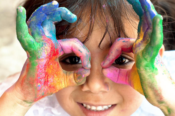 child with finger paint