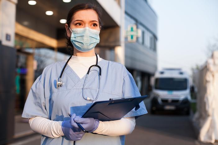 healthcare worker with mask and gloves